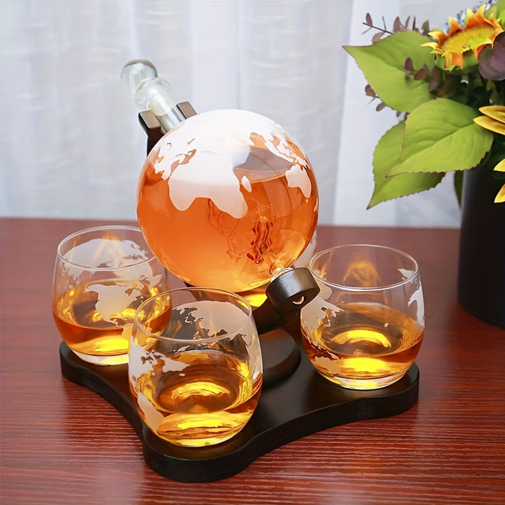 Supplier illustration only: filled globe decanter with an internal ship and staged glasses. Not a statement of included quantity; refer to the first photo and listed set contents.