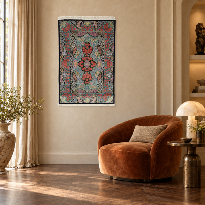 Handmade black silk floral-medallion rug, 130 × 78 cm, displayed unframed on a luxury interior wall; lifestyle visualization