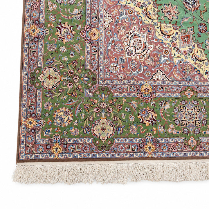 Medallion Shah Abbasi rug - front border and fringe detail on white background